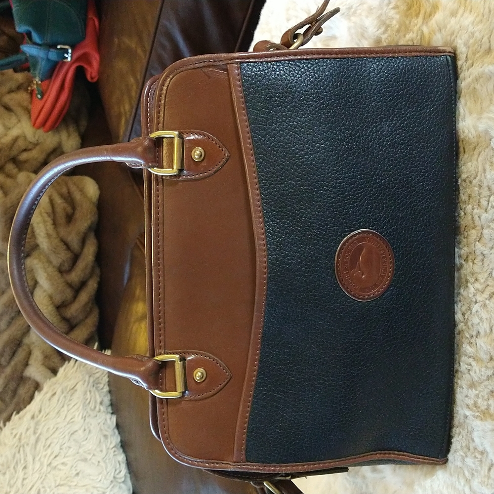 VGUC. Vintage leather Dooney & Bourke crossbody bag.  (wallet sold separately.)